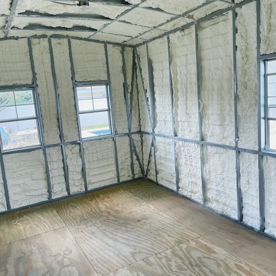 Closed-cell spray foam insulation applied to wall cavities in a residential project in Clarinda